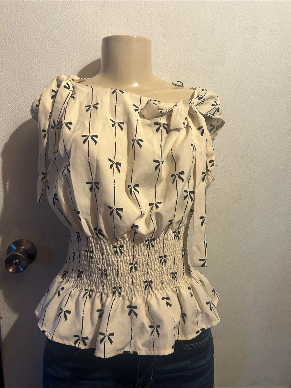 SHEIN Cream Bow-Print Smocked Peplum Top